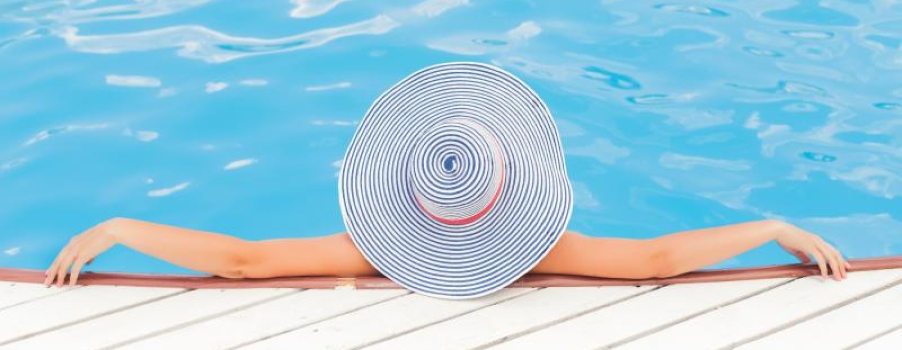 a person lying in a pool
